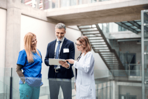 Group of hospital staff discussing patient