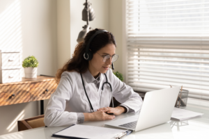 Female doctor virtually consulting patient
