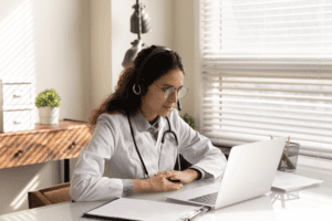 Female doctor virtually consulting patient