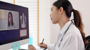 Female doctor virtually consulting COPD patient