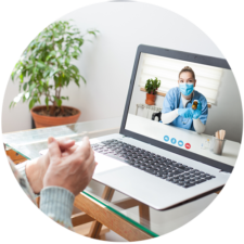 Virtual meeting with doctor on laptop to discuss prescription medication